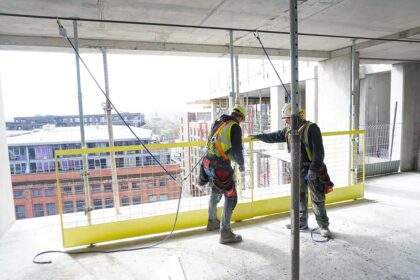 Installing compression posts and safety barriers with Scissorsafe personal fall protection system