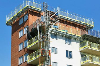 Building hoist, stair tower and edge protection